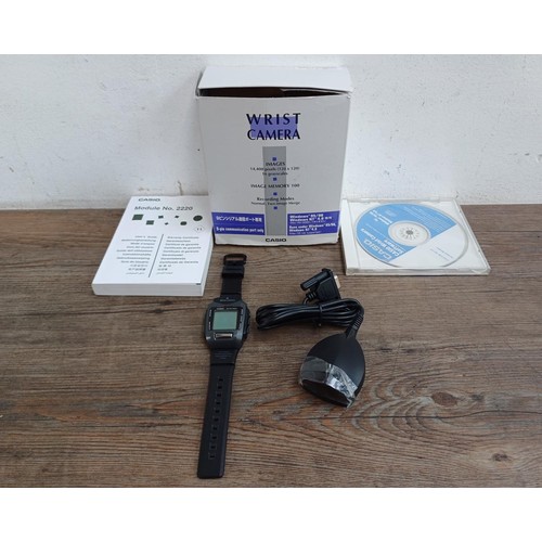 651 - A boxed Casio WQV-1 wrist camera with PAD-2, software disc and instruction manual