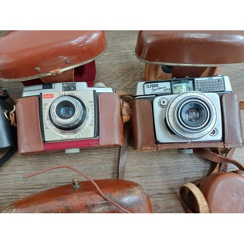 652 - Eight vintage cameras to include Kodak Retinette IB, Agfa Isolette I folding, Agfa Optima, Ilford Sp... 