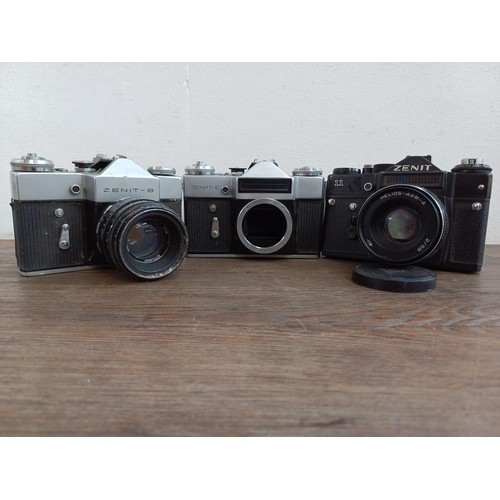 656 - Three KMZ Zenit 35mm SLR cameras, one E body, one B fitted with Helios-44-2 2/58 lens and one 11 fit... 