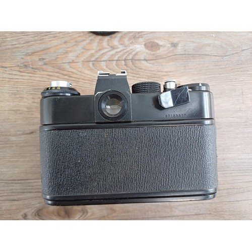 656 - Three KMZ Zenit 35mm SLR cameras, one E body, one B fitted with Helios-44-2 2/58 lens and one 11 fit... 