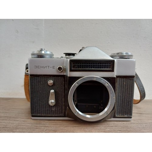 656 - Three KMZ Zenit 35mm SLR cameras, one E body, one B fitted with Helios-44-2 2/58 lens and one 11 fit... 