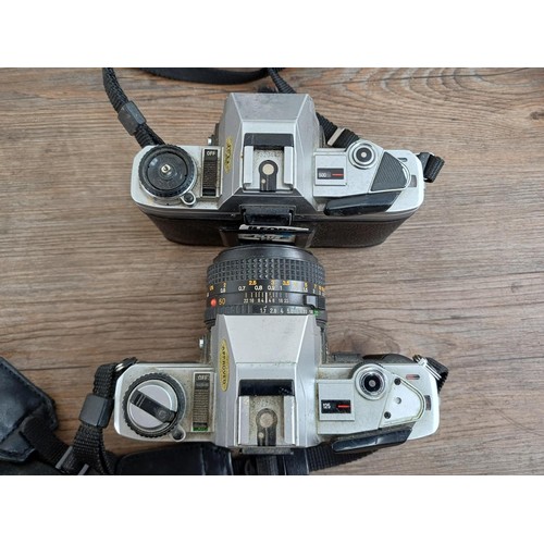 657 - Four Minolta 35mm SLR cameras, one X-300 body, one X-300 fitted with MD1:1.7 50mm lens, one 5000 fit... 