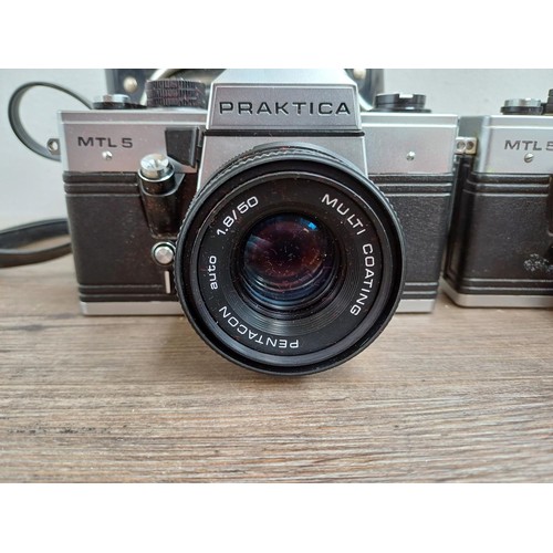 658 - Five Praktica 35mm SLR cameras, one MTL5B fitted with Carl Zeiss Tessar 2.8/50 lens, one MTL5 fitted... 