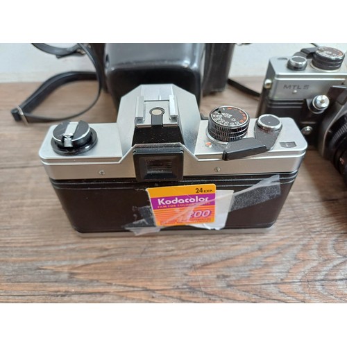 658 - Five Praktica 35mm SLR cameras, one MTL5B fitted with Carl Zeiss Tessar 2.8/50 lens, one MTL5 fitted... 