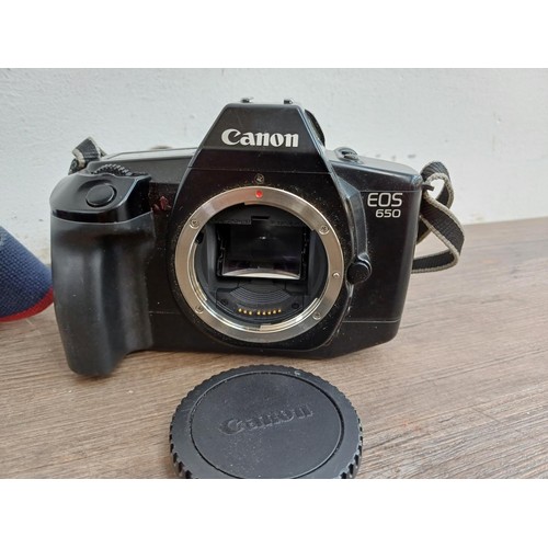 660 - Three Canon EOS autofocus 35mm SLR cameras, one 650 body with Quartz Date Back E, one 500 fitted wit... 