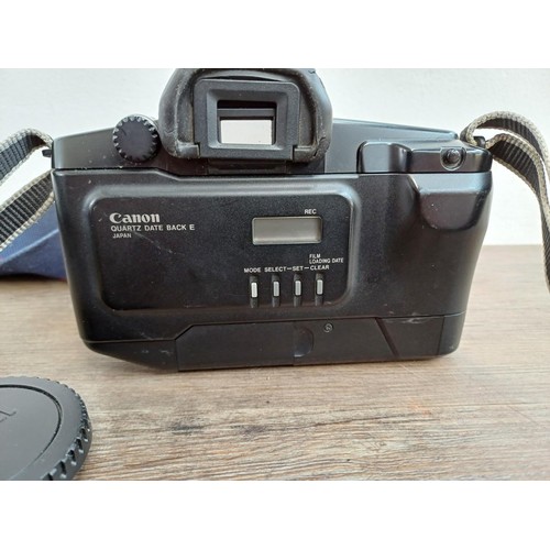 660 - Three Canon EOS autofocus 35mm SLR cameras, one 650 body with Quartz Date Back E, one 500 fitted wit... 