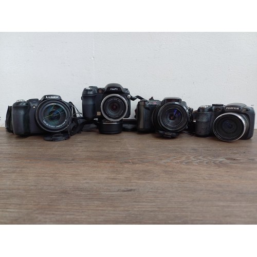 664 - Four compact digital bridge cameras, one Panasonic DMC-FZ200, one Fujifilm FinePix S1730 12mp, one F... 