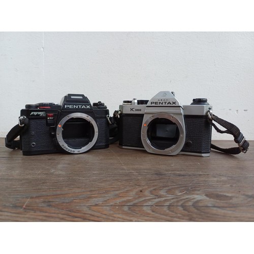 665 - Two Asahi Opt. Co. Pentax 35mm SLR camera bodies, one 1970s K1000 and one 1980s Program A