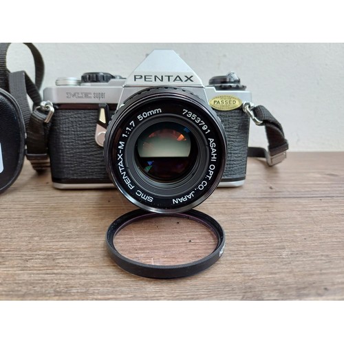 667 - A cased Pentax ME Super 35mm SLR camera fitted with Pentax-M 1:1.7 50mm lens