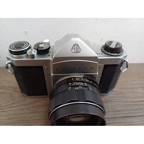 669 - A cased mid 1960s Asahi Opt. Co. Pentax S1a 35mm SLR camera fitted with Super-Takumar 1:2/55 lens