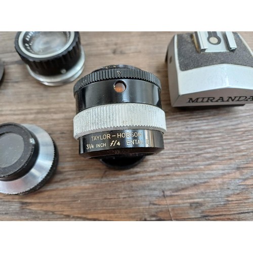 671 - A collection of lenses and photography accessories to include Asahi Opt. Co. Macro-Takumar 1:4/50 le... 