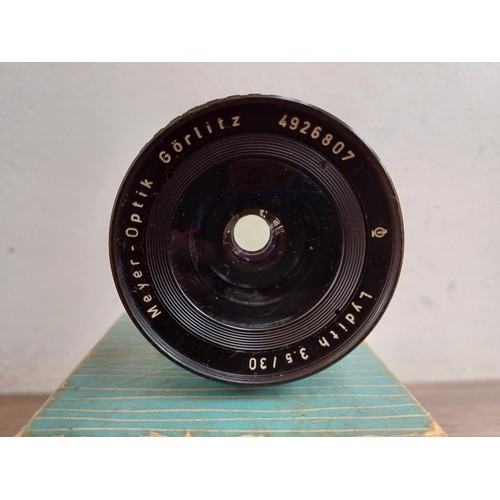 673 - A boxed mid 20th century Meyer-Optik Lydith 3.5/30 lens