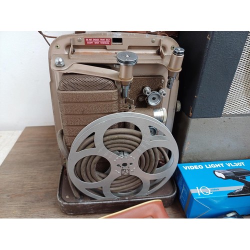 674 - A collection of items to include Bell & Howell 8mm projector, Agfa, Olympus digital and Hanimex came... 