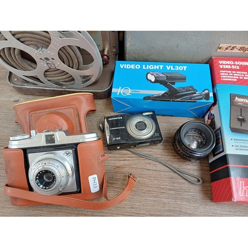 674 - A collection of items to include Bell & Howell 8mm projector, Agfa, Olympus digital and Hanimex came... 