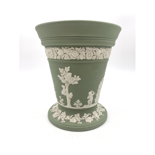 310 - A Wedgwood sage green Jasperware vase and frog - approx. 17cm high