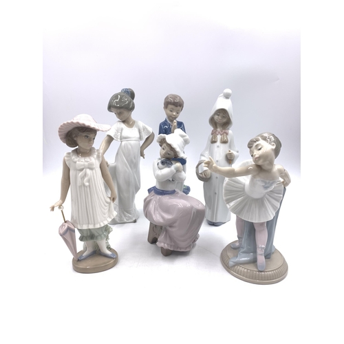 311 - Six Nao and Lladro porcelain figurines - largest approx. 22cm high