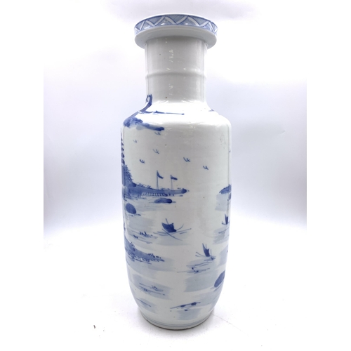 317 - A Chinese blue and white porcelain vase with character marks to base - approx. 36cm high