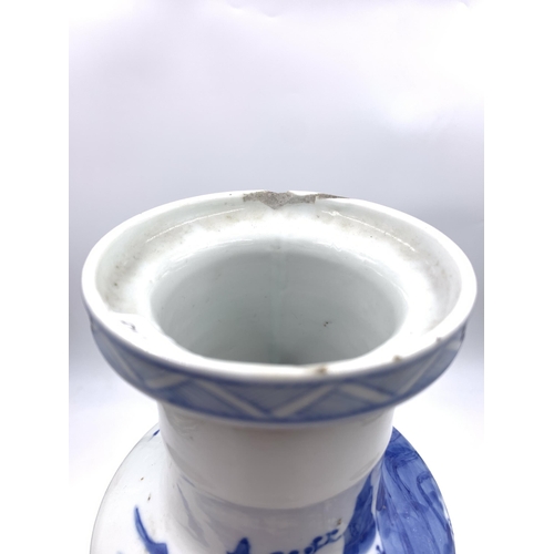 317 - A Chinese blue and white porcelain vase with character marks to base - approx. 36cm high