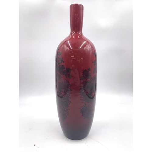 318 - A Royal Doulton Flambé Woodcut no. 1617 vase - approx. 35cm high