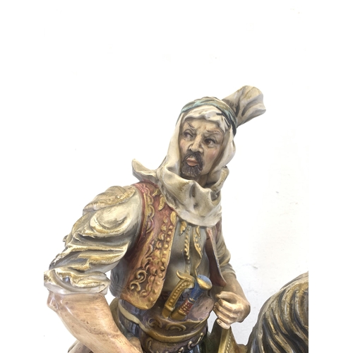 319 - An Italian Capodimonte style hand-painted porcelain figurine of an Arab on horseback - approx. 66cm ... 