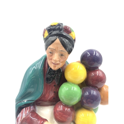 320 - A Royal Doulton The Old Balloon Seller figurine - HN1315