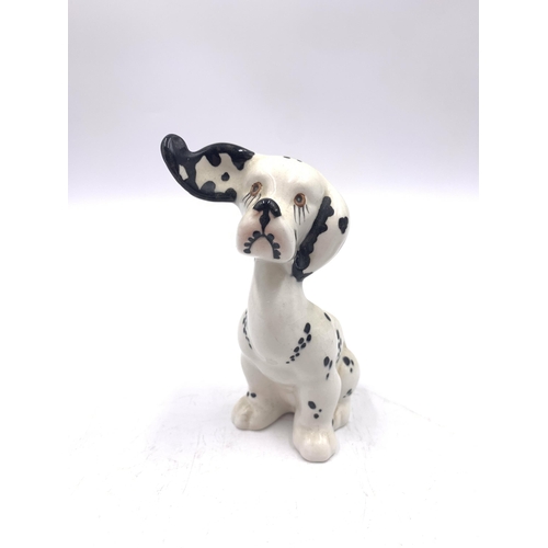 324 - Four ceramic figurines, Beswick The Labrador, Goebel Robin, Beswick Puppit Dalmatian and Acorn 'Out ... 