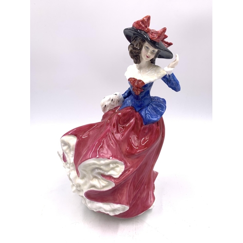 335 - Four Royal Doulton figurines, Ascot HN2356, At Ease HN2473, Belle HN3703 and Janet HN4042