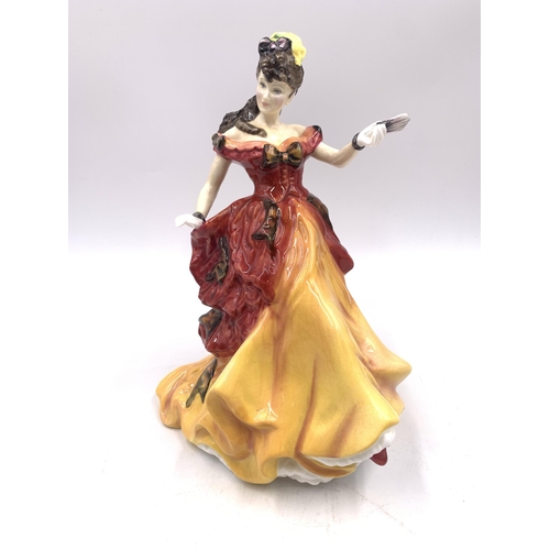 335 - Four Royal Doulton figurines, Ascot HN2356, At Ease HN2473, Belle HN3703 and Janet HN4042