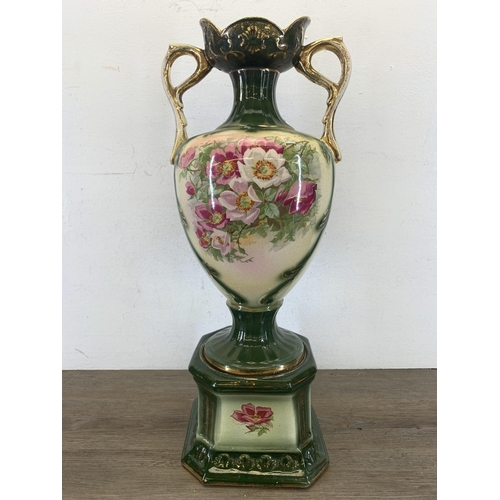 336 - A Victorian style transfer printed and hand decorated pottery twin handled vase - approx. 54cm high