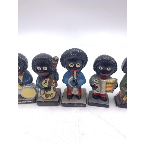 343 - Seven vintage Robertson's hand-painted pottery advertising figurines - approx. 7cm high