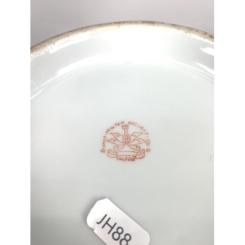 350 - A Chinese Famille Rose hand-painted porcelain circular footed bowl - approx. 35cm diameter