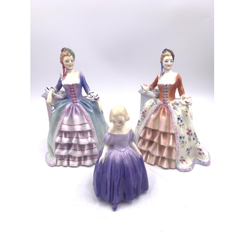 351 - Three Royal Doulton figurines, one Marie HN1370 and two Eleanor, HN 1753 and HN1754