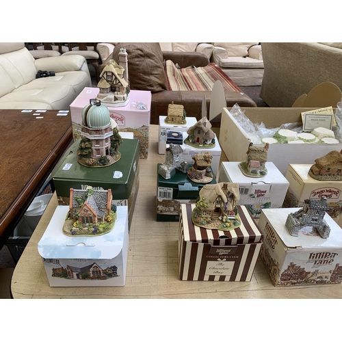 356 - A collection of boxed David Winter and Lilliput Lane handmade cottage sculptures