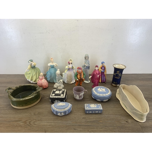 361 - A collection of ceramics to include Wedgwood Jasperware, four Royal Doulton figurines, three Crown S... 