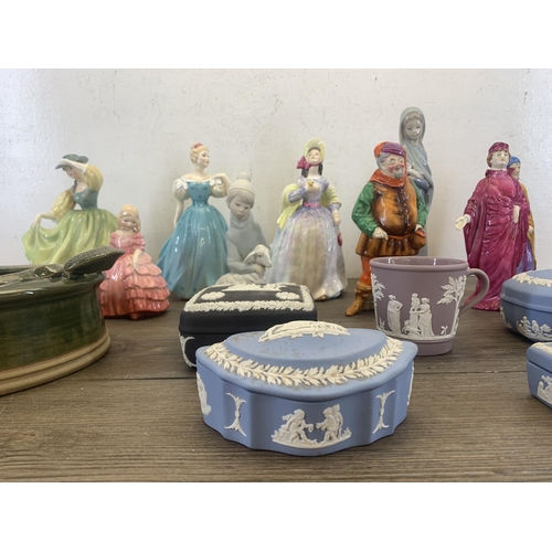 361 - A collection of ceramics to include Wedgwood Jasperware, four Royal Doulton figurines, three Crown S... 