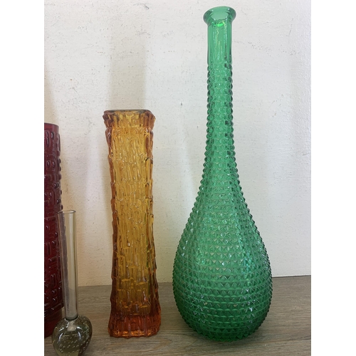 366 - Five pieces of mid 20th century glassware to include Emil Funke red vase, two Empoli genie bottles e... 