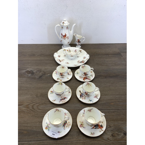 368 - A Royal Doulton H1422 Exotic Bird pattern sixteen piece coffee set