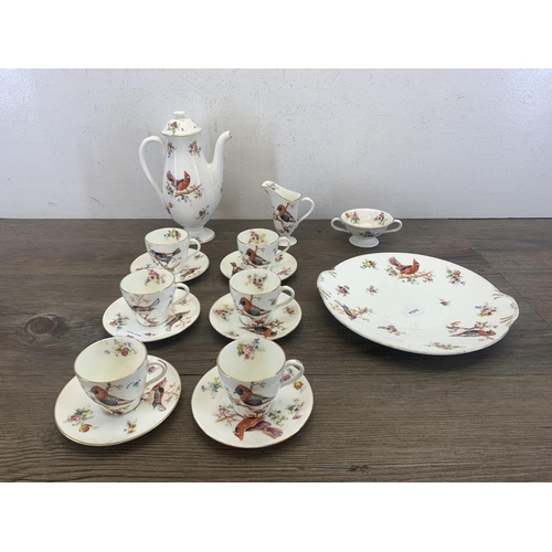 368 - A Royal Doulton H1422 Exotic Bird pattern sixteen piece coffee set