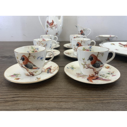 368 - A Royal Doulton H1422 Exotic Bird pattern sixteen piece coffee set