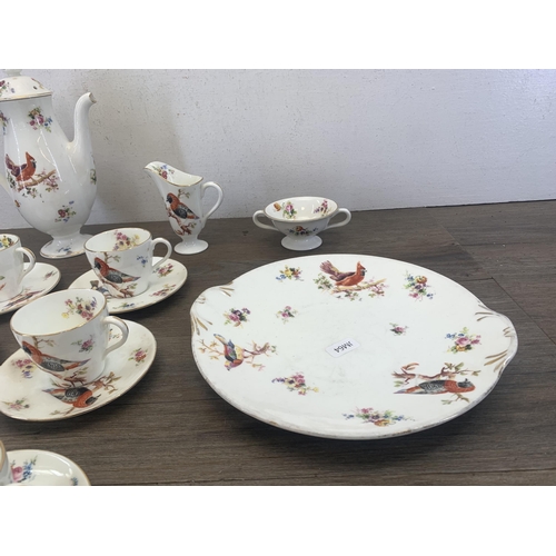 368 - A Royal Doulton H1422 Exotic Bird pattern sixteen piece coffee set