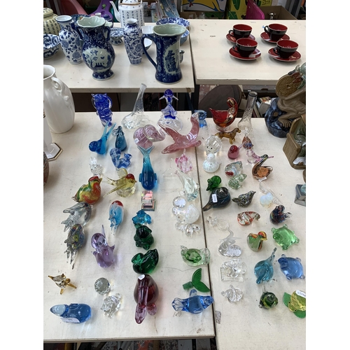 371 - A collection of art glassware to include bird paperweights, dolphin figurine etc. together with a cu... 