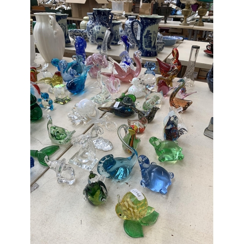 371 - A collection of art glassware to include bird paperweights, dolphin figurine etc. together with a cu... 