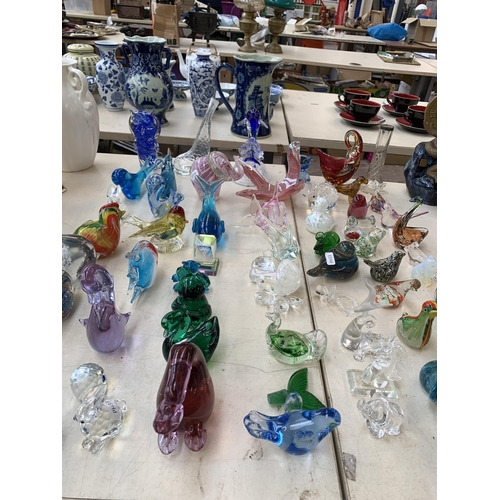 371 - A collection of art glassware to include bird paperweights, dolphin figurine etc. together with a cu... 