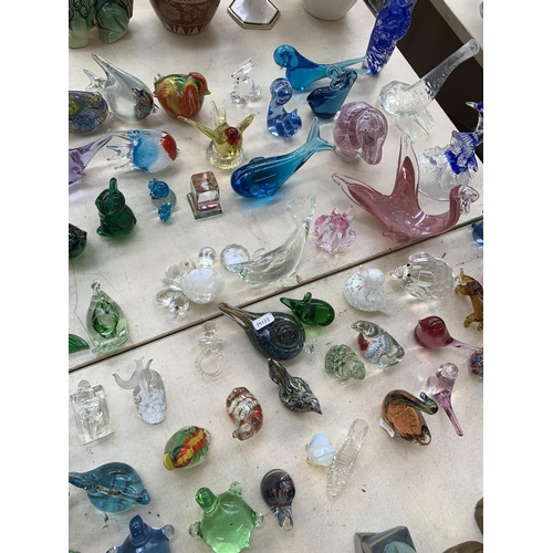 371 - A collection of art glassware to include bird paperweights, dolphin figurine etc. together with a cu... 