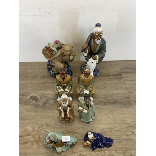 372 - Eight Chinese porcelain figurines - largest approx. 37cm high