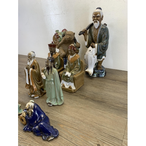 372 - Eight Chinese porcelain figurines - largest approx. 37cm high