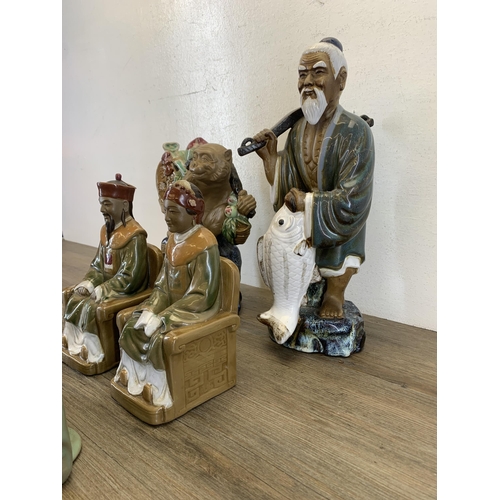 372 - Eight Chinese porcelain figurines - largest approx. 37cm high