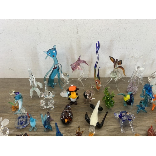 373 - A collection of Venetian hand blown glass figurines and ornaments to include sweets, animals etc.