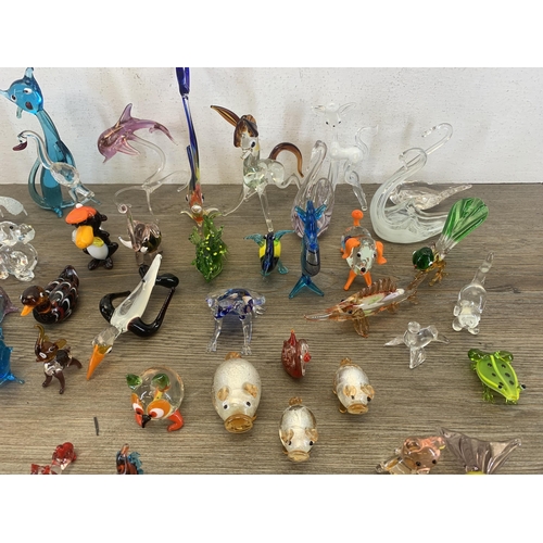 373 - A collection of Venetian hand blown glass figurines and ornaments to include sweets, animals etc.