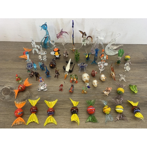 373 - A collection of Venetian hand blown glass figurines and ornaments to include sweets, animals etc.